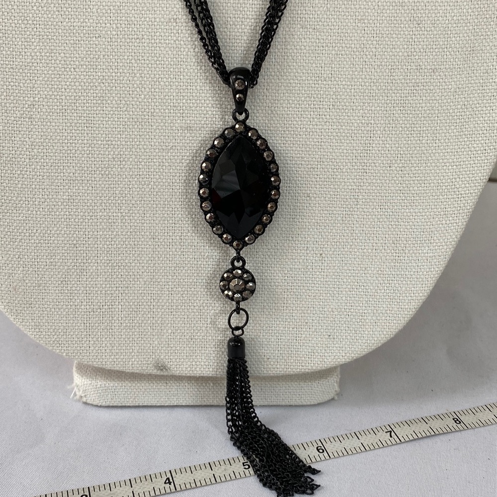 Long black chain and black faceted medallion necklace